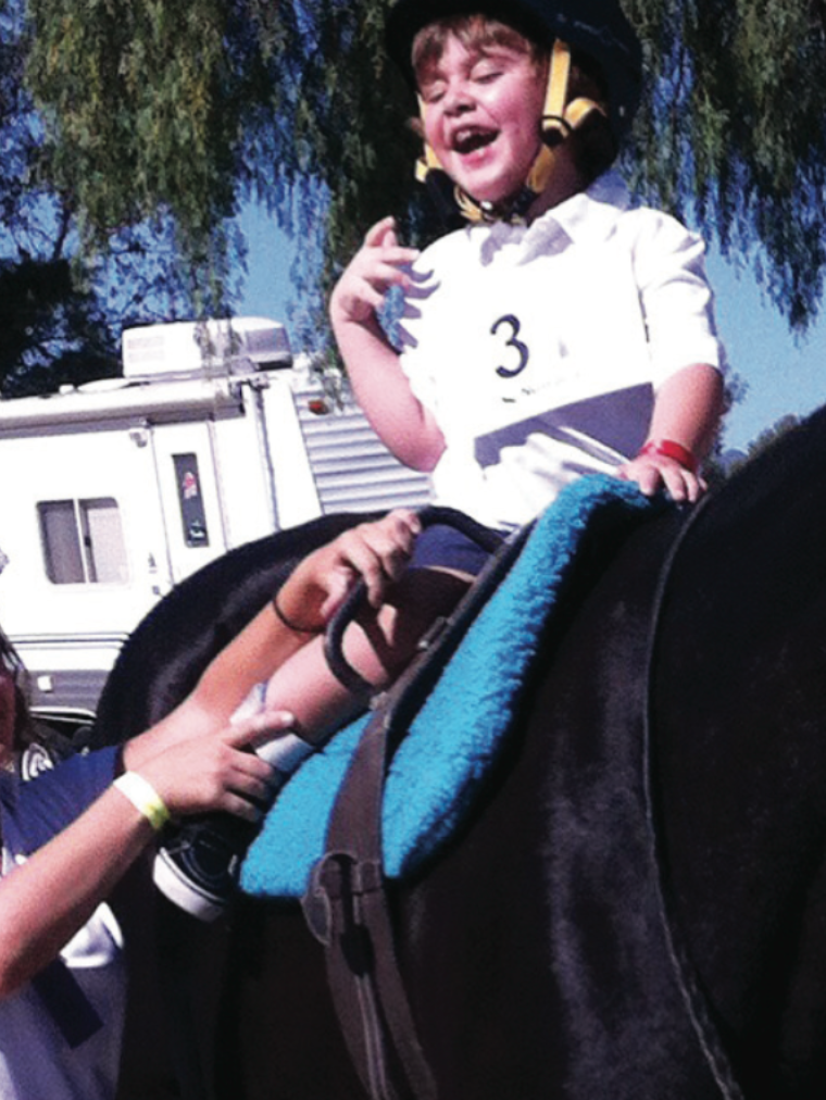 Visually impaired boy rides horse